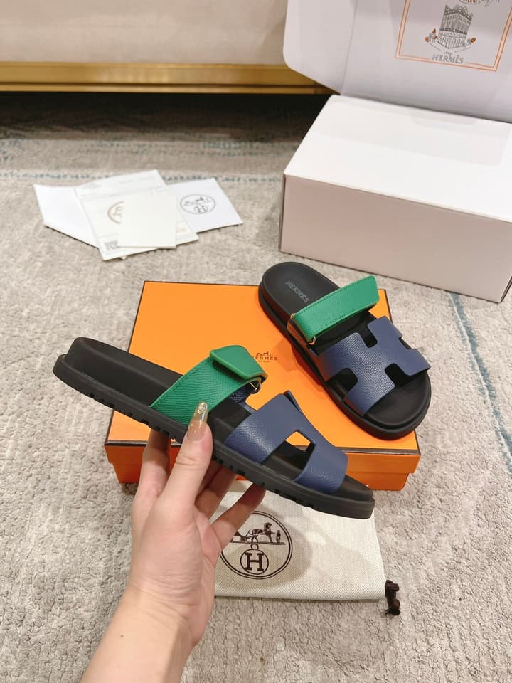 Hermès Chypre Suede Unisex Slides in Black With Dark Blue Strap