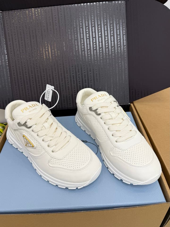 Prada Triangle Logo Sporty Sneakers – 2025 Early Autumn Collection in Black