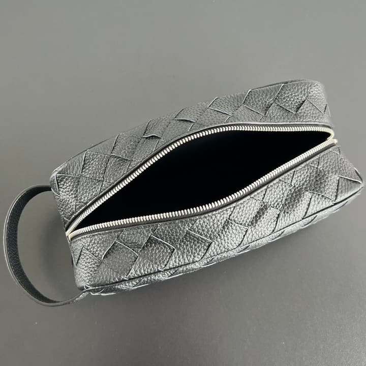 Bottega Veneta Intrecciato Grained Pouch in Black Woven Leather