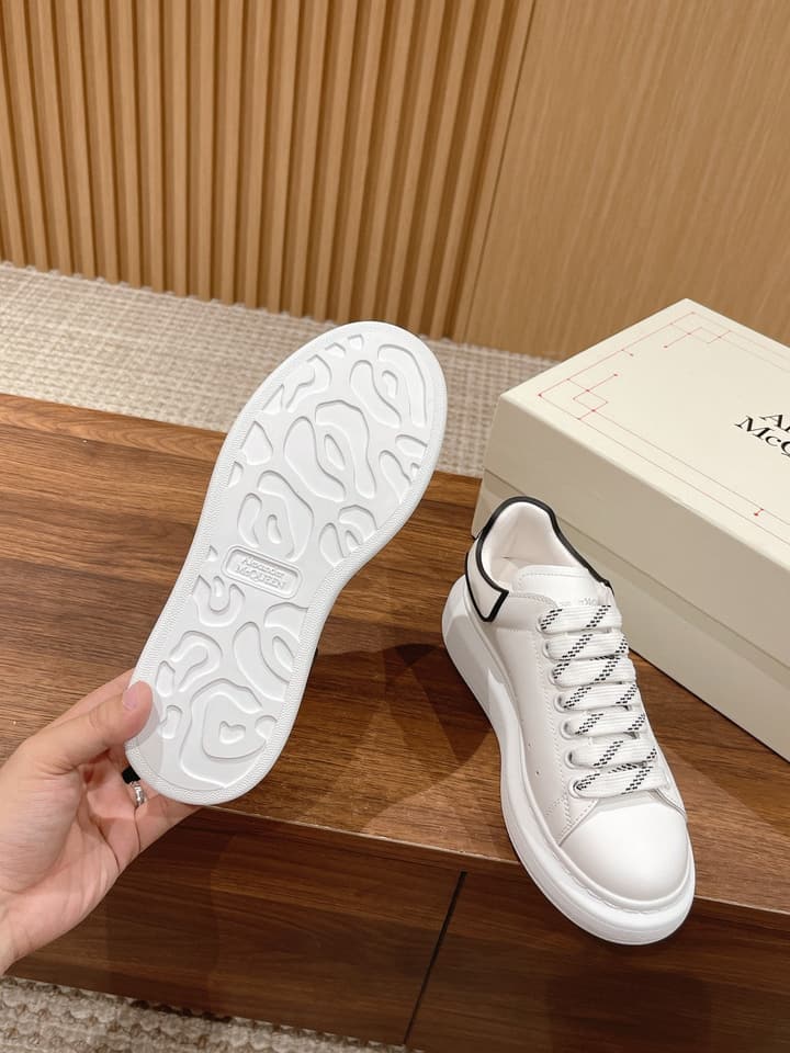 Alexander McQueen Classic Versatile White Sneakers in White With Black Laces & Heel