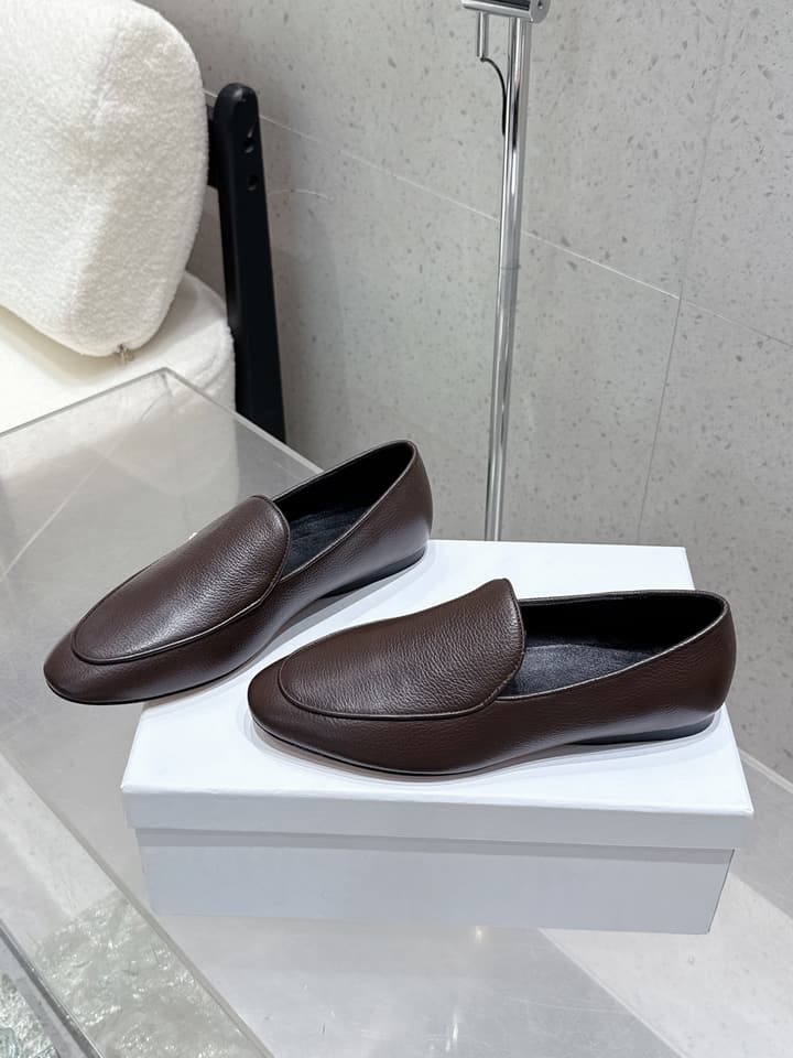 The Row Tassel Loafers in Black Suede