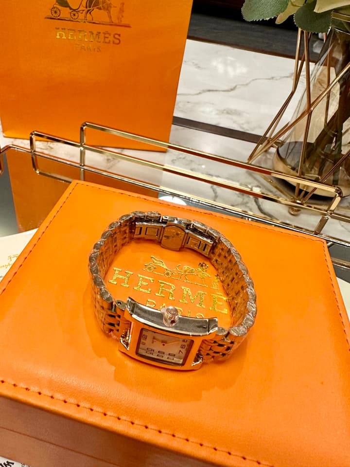 Hermès Small Square Luxury Watch in Dark Dial Patterned Gold Bracelet