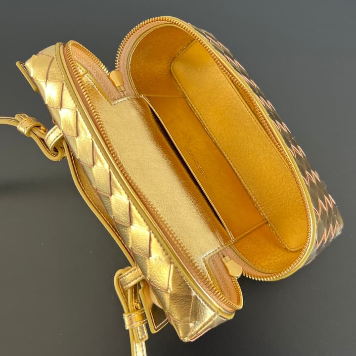 Bottega Veneta Intrecciato Vanity Case in Metallic Gold