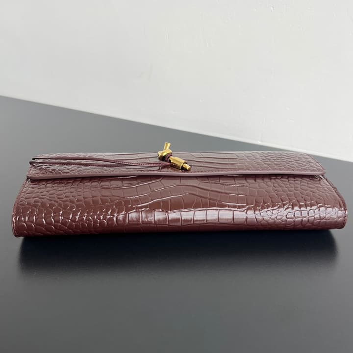 Bottega Veneta Crocodile Embossed Intrecciato Clutch in Gold