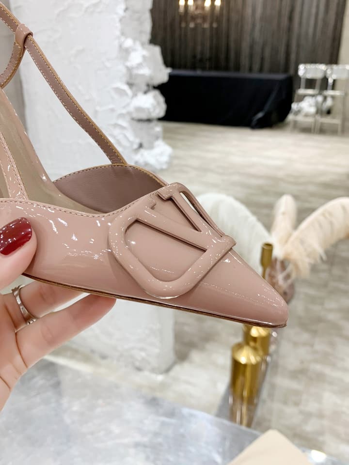 Valentino VLogo Pointed-Toe Patent Leather Pumps in Black Patent