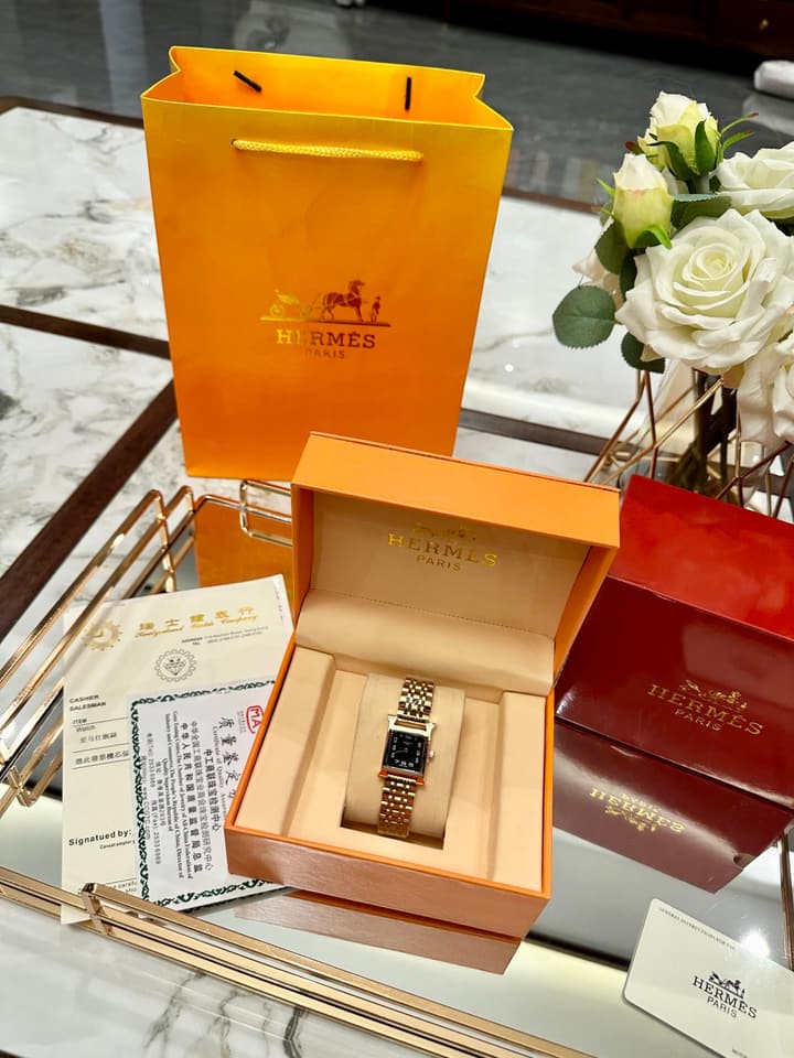 Hermès Small Square Luxury Watch in Dark Dial Patterned Gold Bracelet