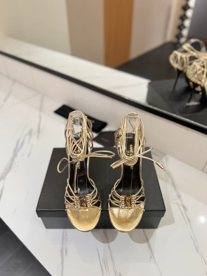 Saint Laurent Letter Buckle Pumps in Bright Gold
