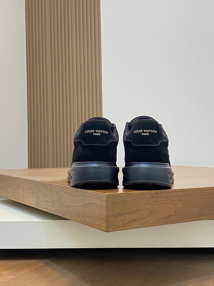 Louis Vuitton Embossed Calfskin Sneakers in Black