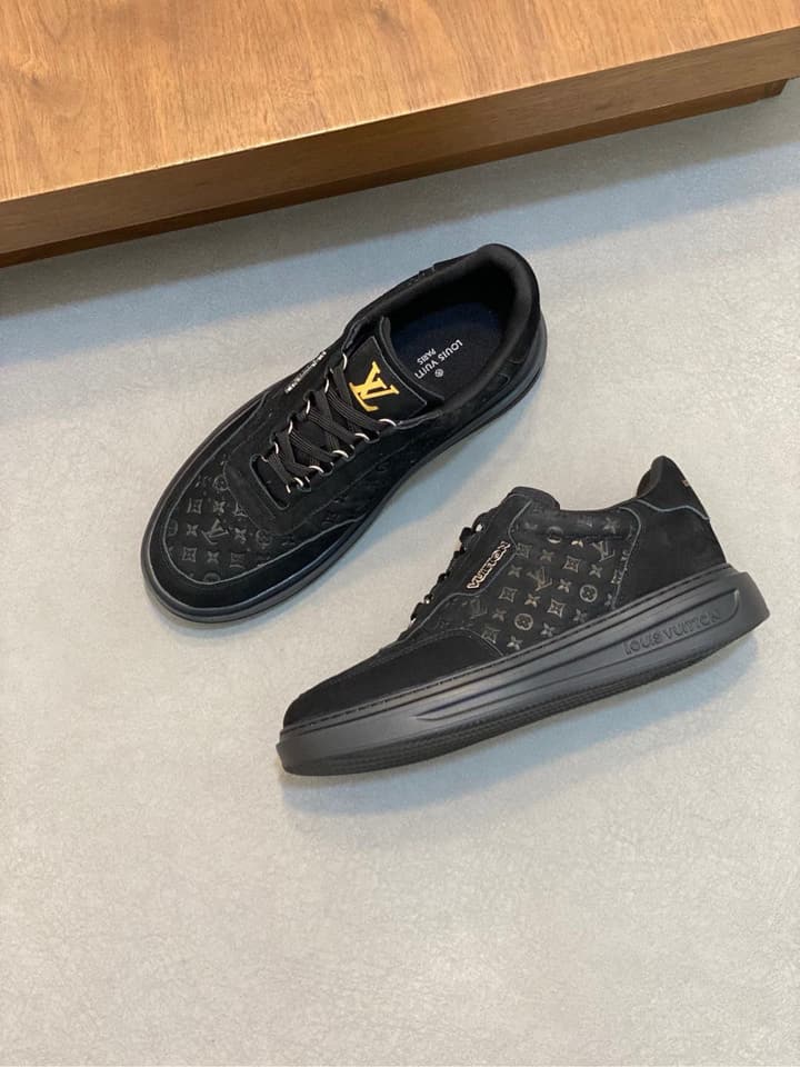 Louis Vuitton Embossed Calfskin Sneakers in Black