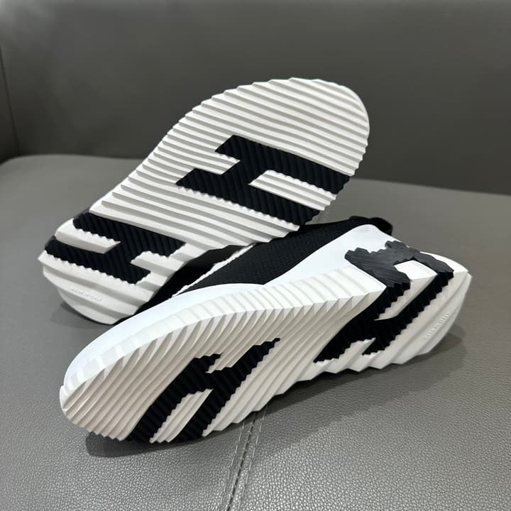 Hermès Bouncing Tech Mesh Sneakers in Black And White
