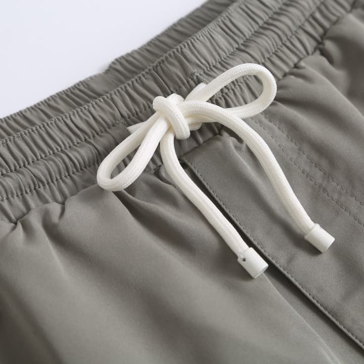 Brunello Cucinelli Embroidered Swim Trunks in Navy Blue