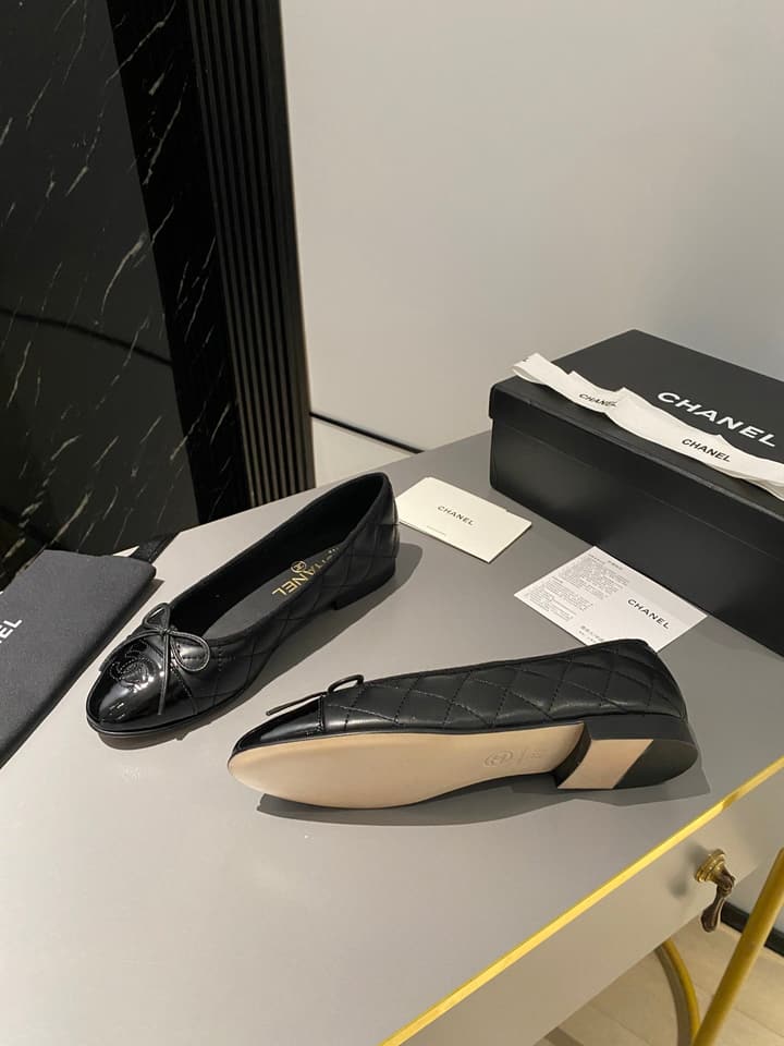 Chanel Classic Ballet Flats in Tan With Black Cap Toe