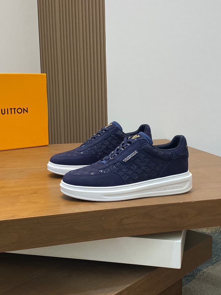 Louis Vuitton Embossed Calfskin Sneakers in Black
