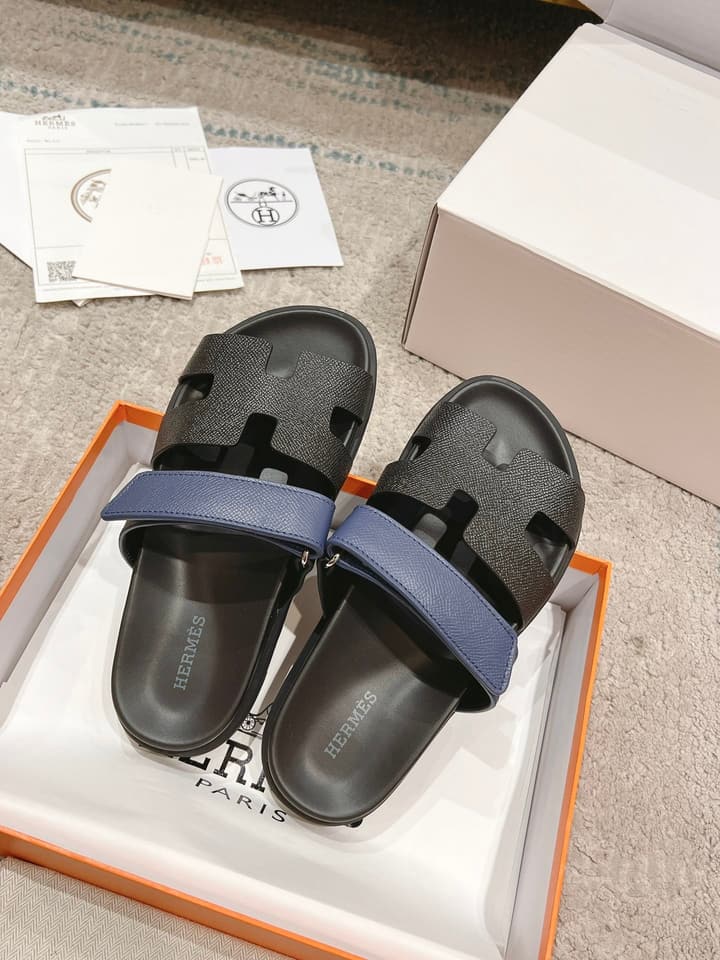 Hermès Chypre Suede Unisex Slides in Black With Dark Blue Strap
