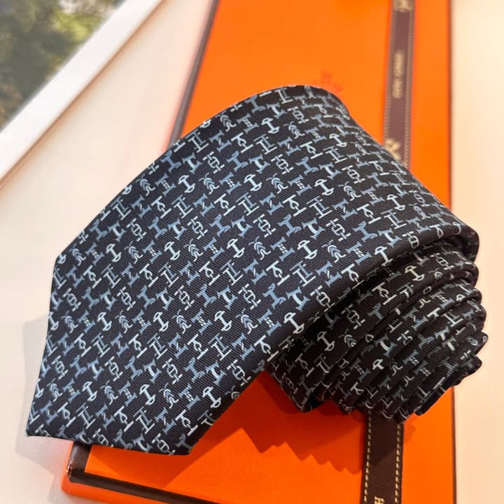 Hermès Men's Printed Silk Tie Series in Light Aqua Patterned