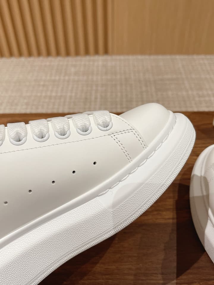 Alexander McQueen Classic Versatile White Sneakers in White With Black Laces & Heel