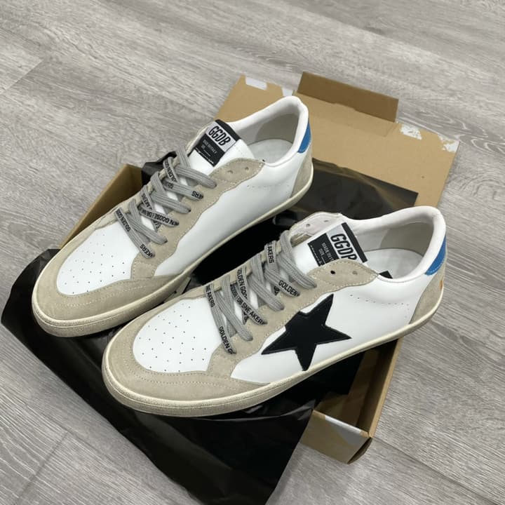 Golden Goose Ball Star Distressed Sneakers – 2023 Spring Collection in White Distressed With Blue Heel And Black Star