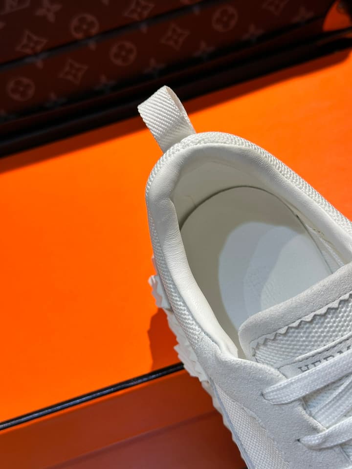 Hermès Bouncing Calfskin Mesh Sneakers in Black With White Stripe