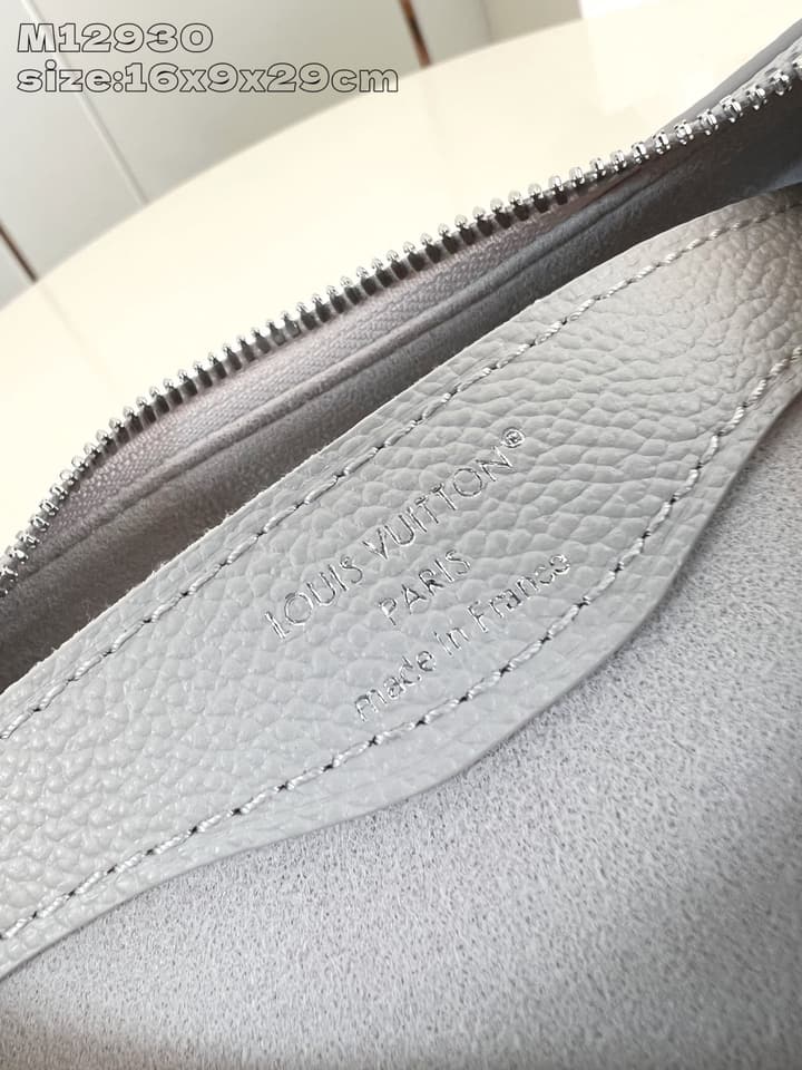 Louis Vuitton Boulogne Monogram Embossed Bag in Beige