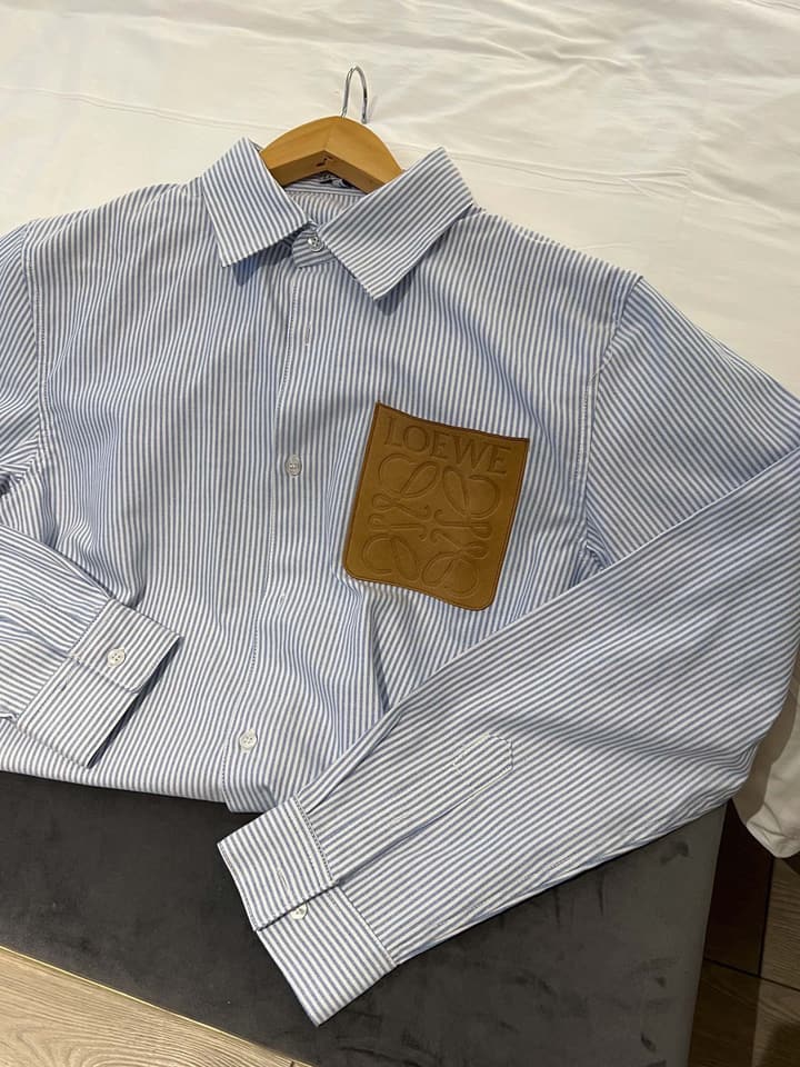 Loewe Embossed Logo Suede Pocket Striped Shirt in Tan Loewe Pouch, Light Blue Overshirt, Black Skirt - View 1