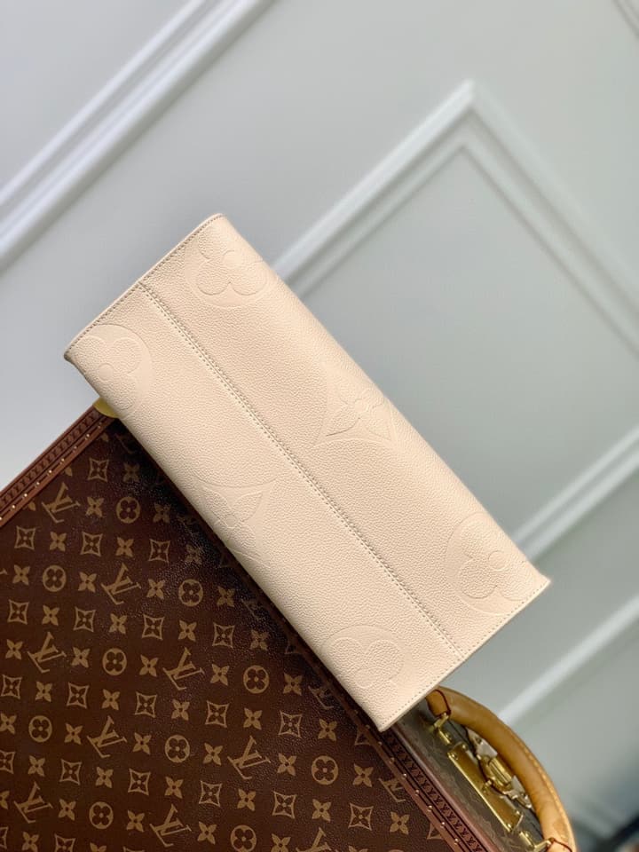Louis Vuitton OnTheGo Medium Monogram Empreinte Tote in Cream Monogram Empreinte