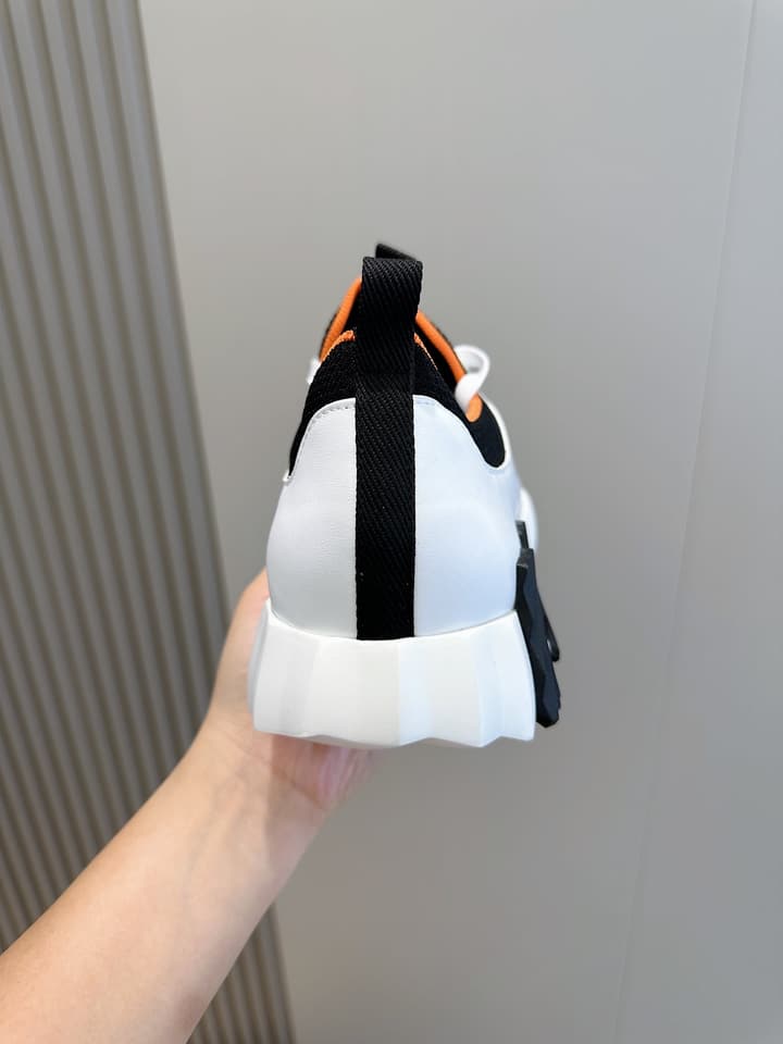 Hermès Bouncing Sneakers in Black And White Color Block