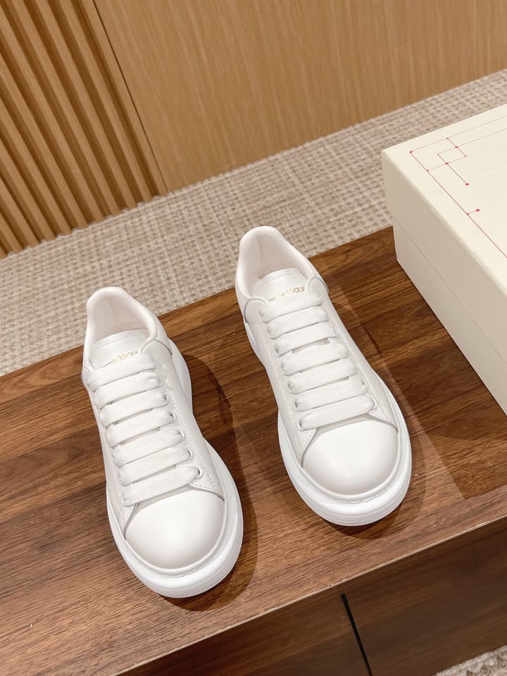 Alexander McQueen Classic Versatile White Sneakers in White With Black Laces & Heel