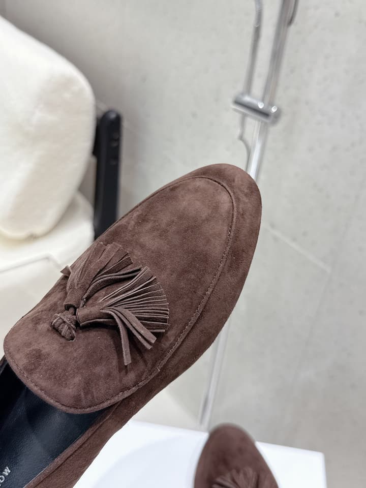 The Row Tassel Loafers in Black Suede