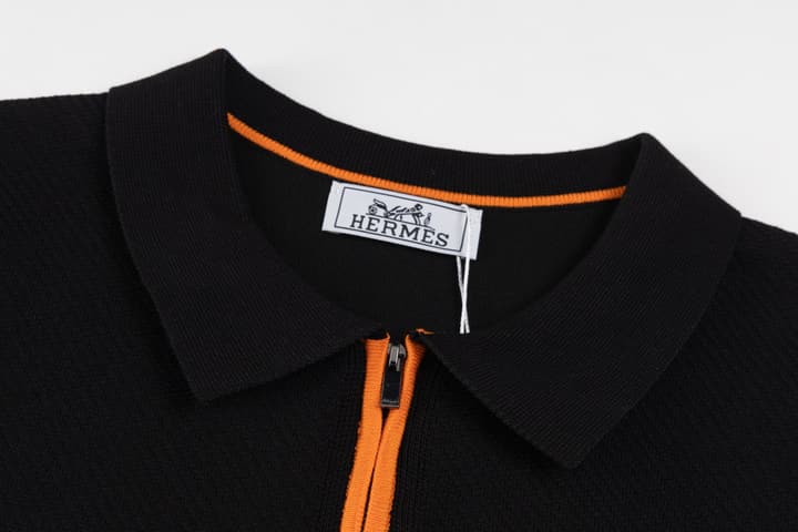 Hermès Retro Knitted Polo Shirt – SS24 in Black Polo With Orange Placket