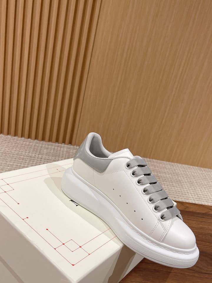 Alexander McQueen Classic Versatile White Sneakers in White With Black Laces & Heel