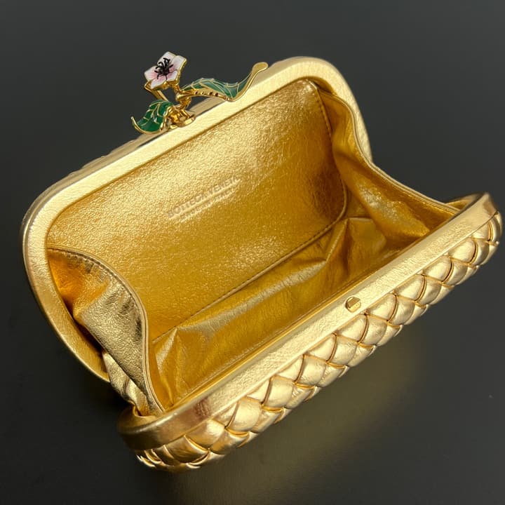 Bottega Veneta Woven Leather Floral Knot Clutch Bag in Gold Woven Leather With Floral Clasp
