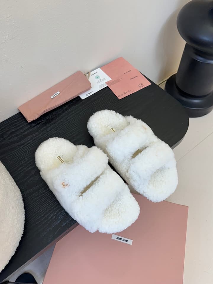 Miu Miu Sheepskin Mules in Black