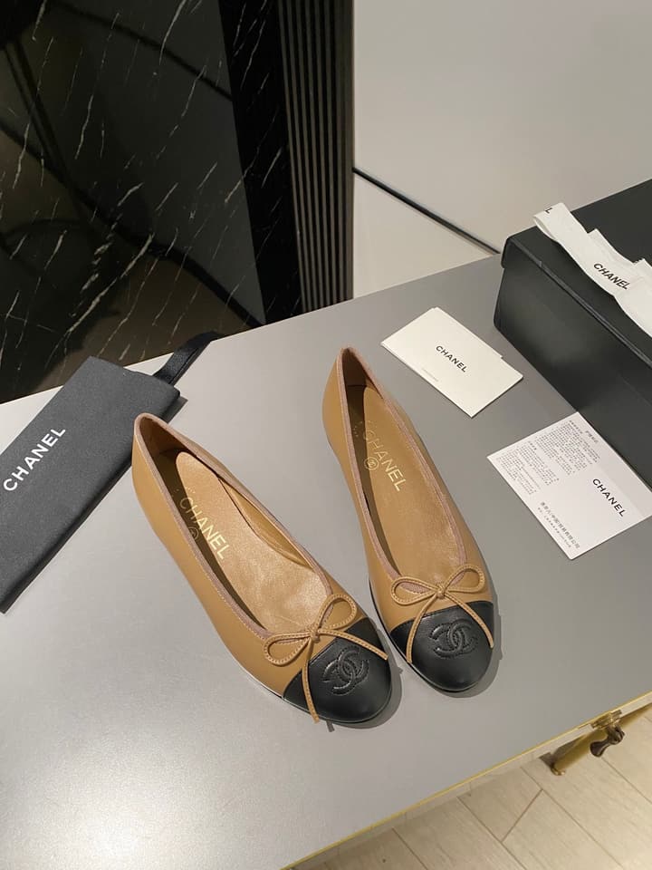 Chanel Classic Ballet Flats in Tan With Black Cap Toe