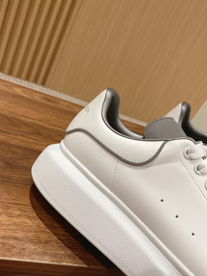 Alexander McQueen Classic Versatile White Sneakers in White With Black Laces & Heel