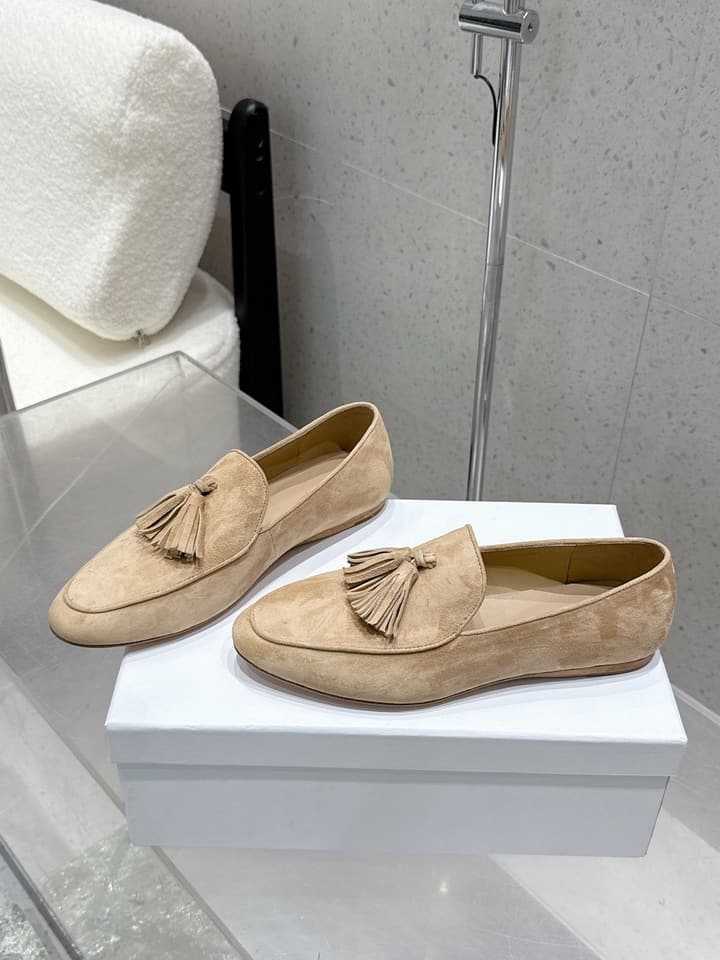 The Row Tassel Loafers in Black Suede