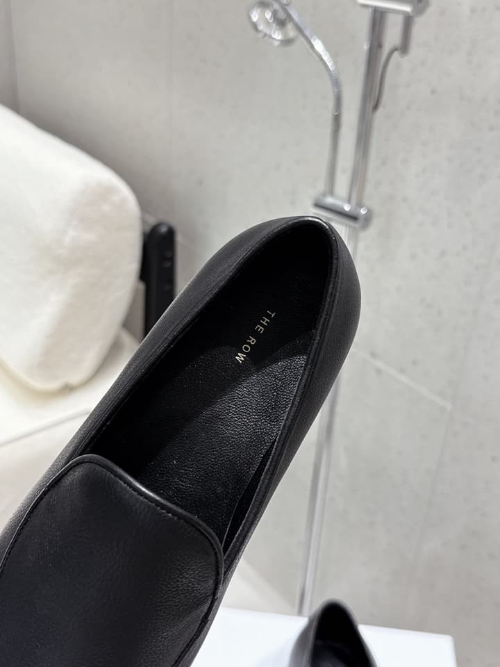 The Row Tassel Loafers in Black Suede