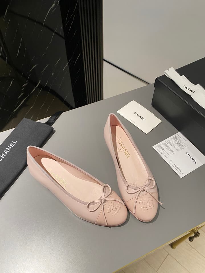 Chanel Classic Ballet Flats in Tan With Black Cap Toe