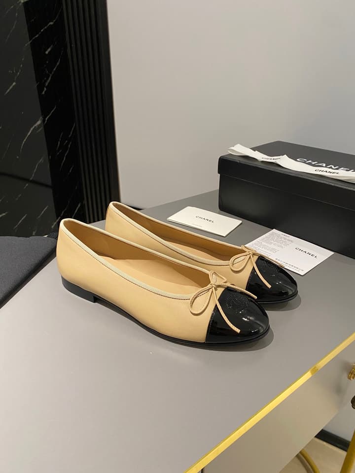 Chanel Classic Ballet Flats in Tan With Black Cap Toe