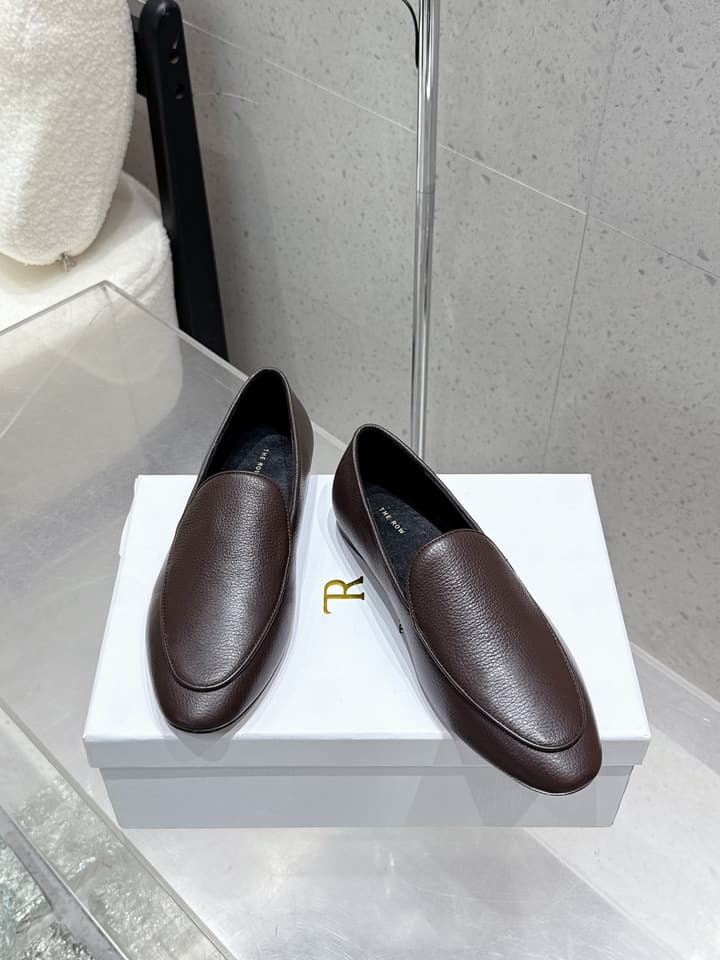 The Row Tassel Loafers in Black Suede