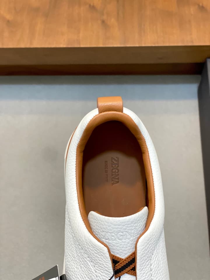 Ermenegildo Zegna Triple Stitch Sneakers in Black Leather With Brown Tag