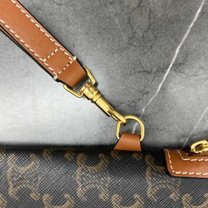 Celine Clutch Bag with Wrist Strap in Dark Monogram With Brown Trim