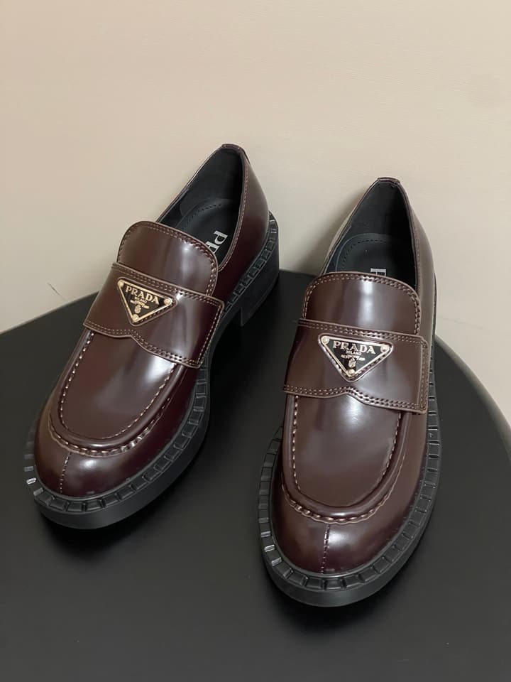 Prada Triangle Logo Platform Loafers in Black