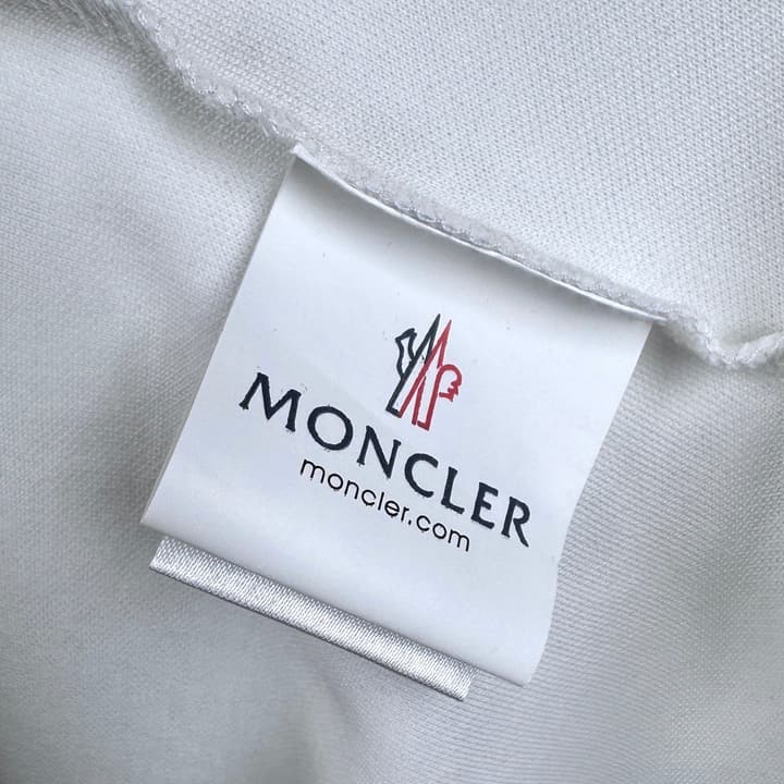 Moncler Classic Embroidered Long-Sleeve Polo Shirt in Black Polo - Hanging Display