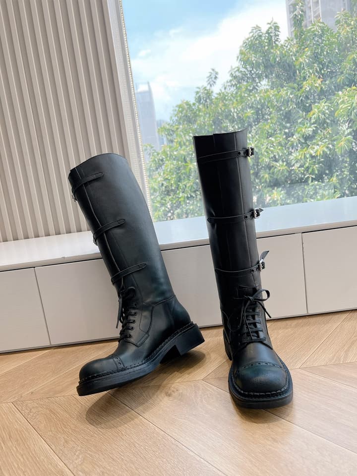 Miu Miu Distressed Biker Knee-High Boots – Autumn/Winter Runway Edition in Distressed Black Moto Boots