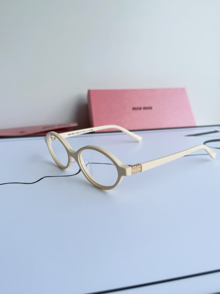 Miu Miu SMU04Z Black Frame Transparent Lens Sunglasses – 2023 Autumn/Winter Collection in Beige