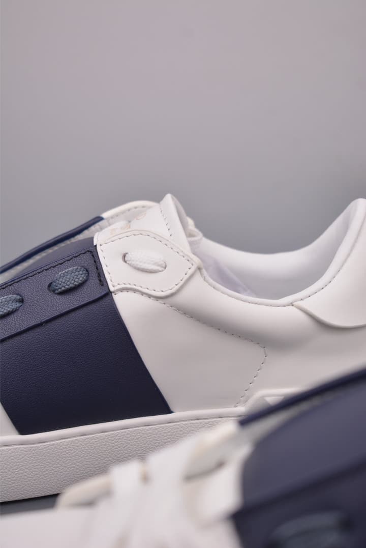 Valentino Rockstud Untitled Rivet Sneakers – 2025 Collection in White With Black Band