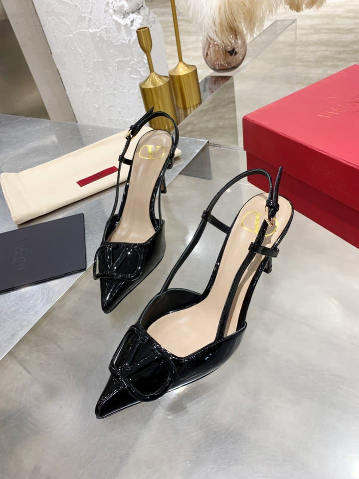 Valentino VLogo Pointed-Toe Patent Leather Pumps in Black Patent