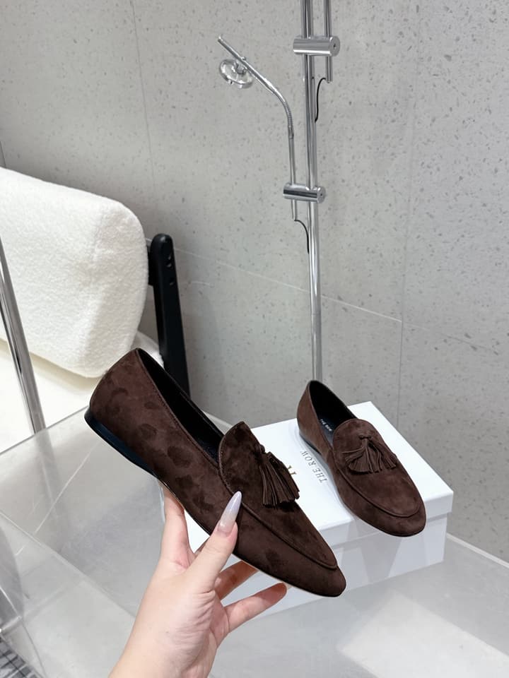 The Row Tassel Loafers in Black Suede