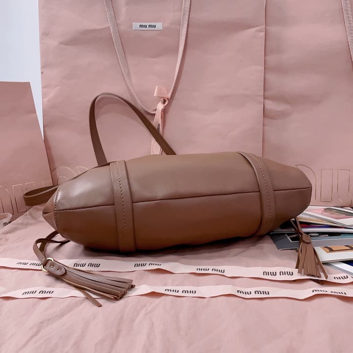 Miu Miu Tassel Drawstring Bucket Bag – New Collection in Black