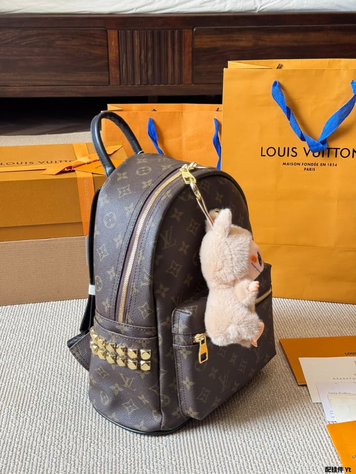 Louis Vuitton Monogram Mini Backpack in Monogram With Light Blue Charm
